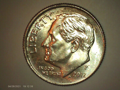 2012 Roosevelt dime off-center strike error showing blank planchet crescent and shifted design